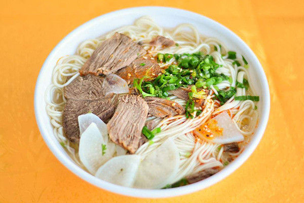 楊記蹺腳牛肉面加盟熱線是多少